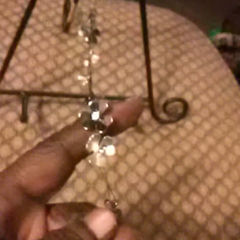 Necklace approximately 26"chain with flowers leafs